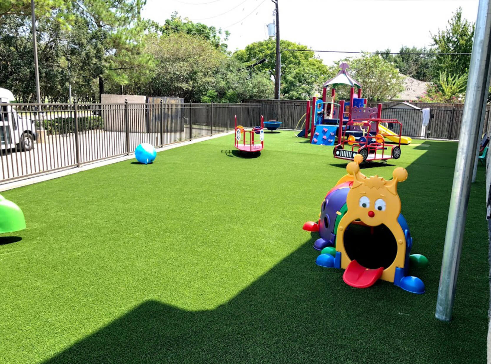 3 Benefits Of Installing Artificial Turf In Playgrounds   Playground With Artificial Turf Installation 