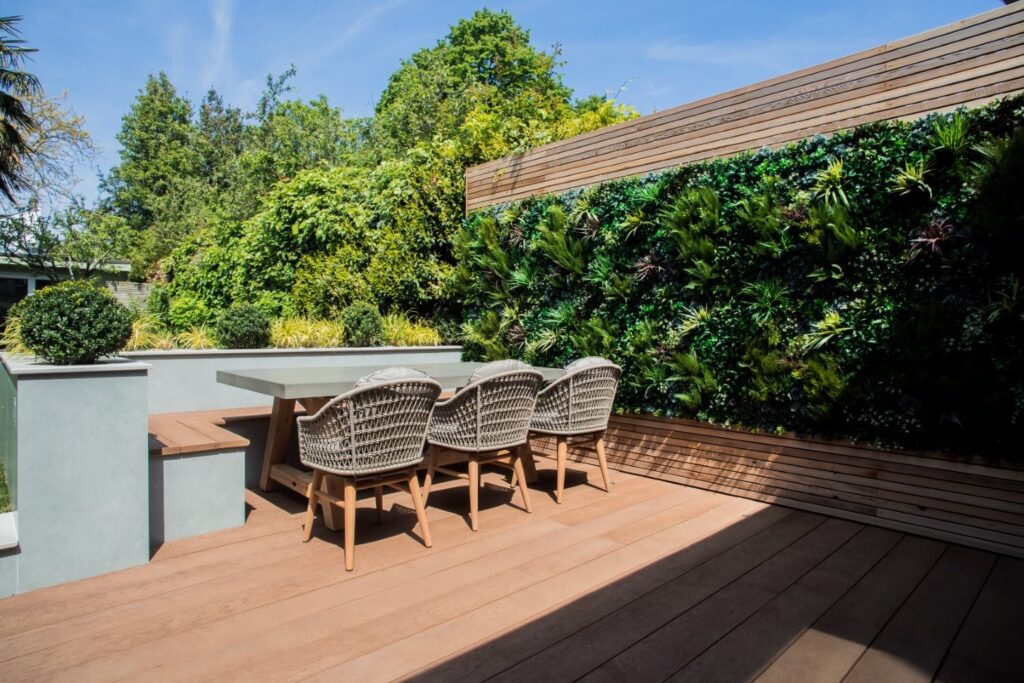 Outdoor patio with green wall panels